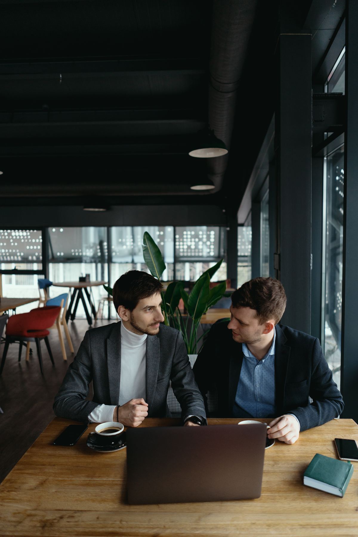 Two professionals planning a website and app project